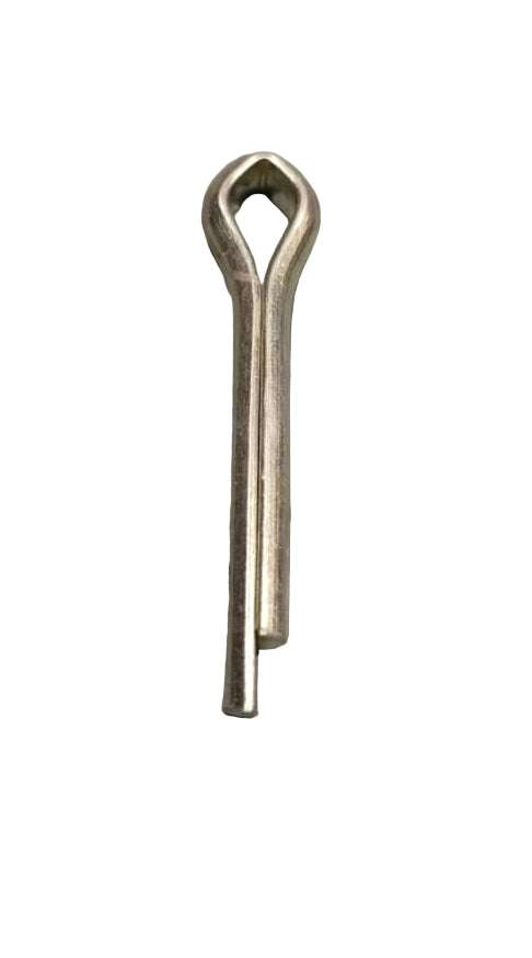 Small metal tool on a textured gray surface