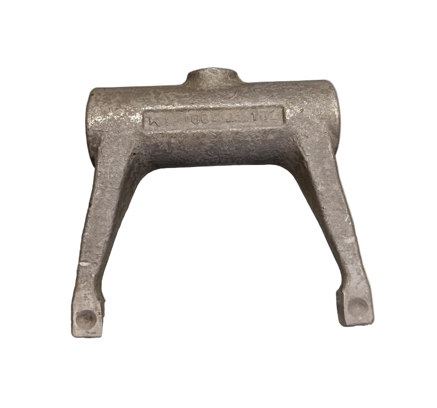Metal bracket on a gray surface