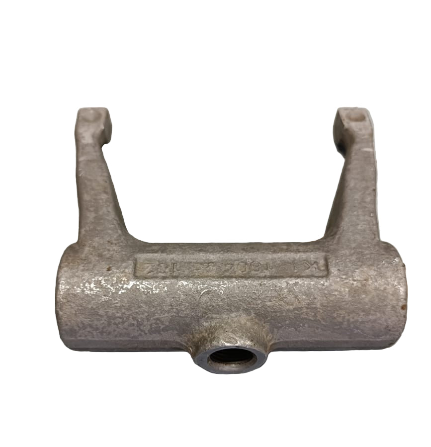 Metal component on a gray surface