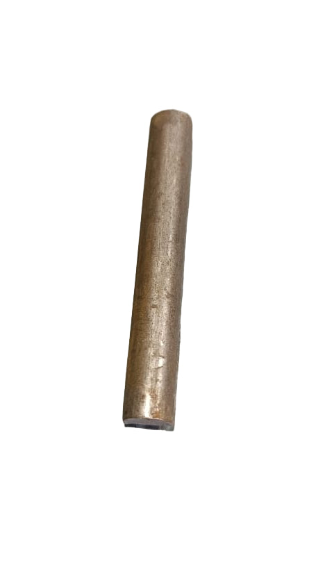 Metal cylindrical object on a textured gray surface
