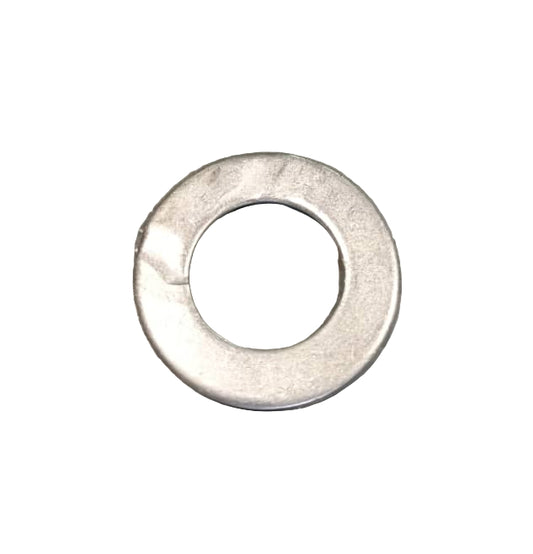Metal washer on a gray surface
